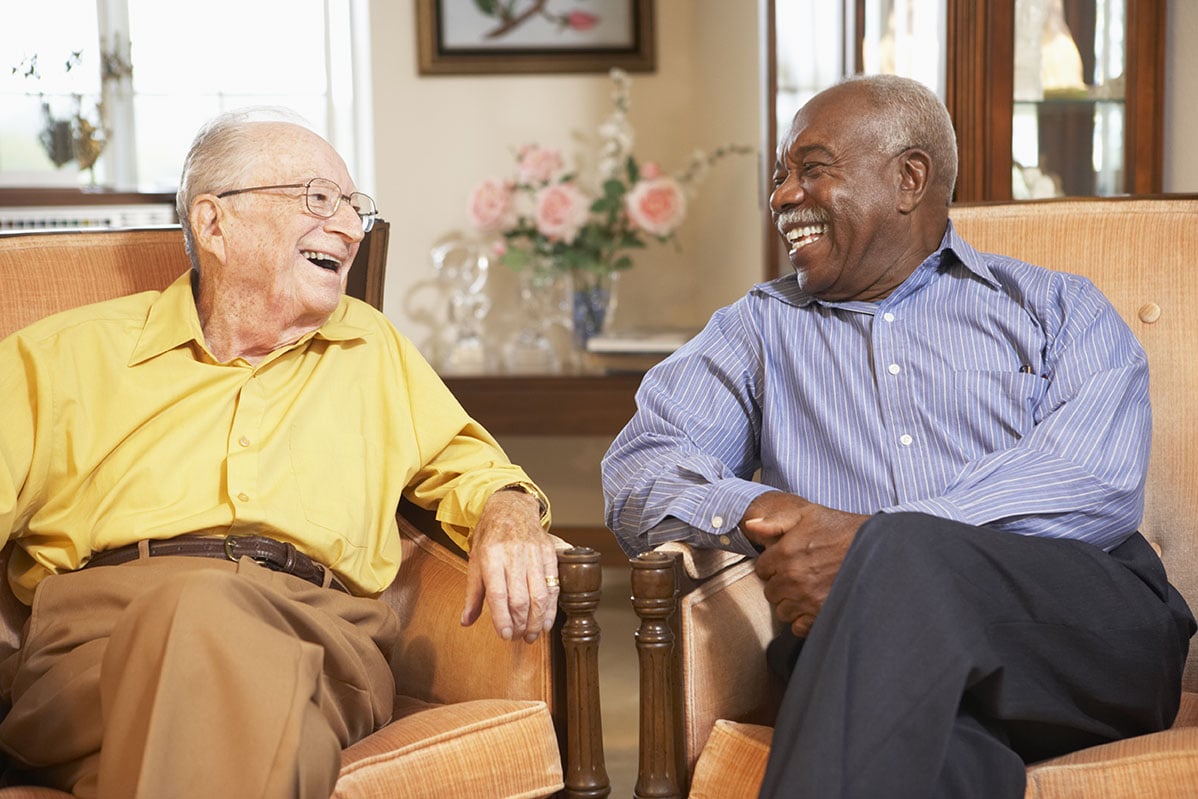 Residents laughing together at Liberty Heights